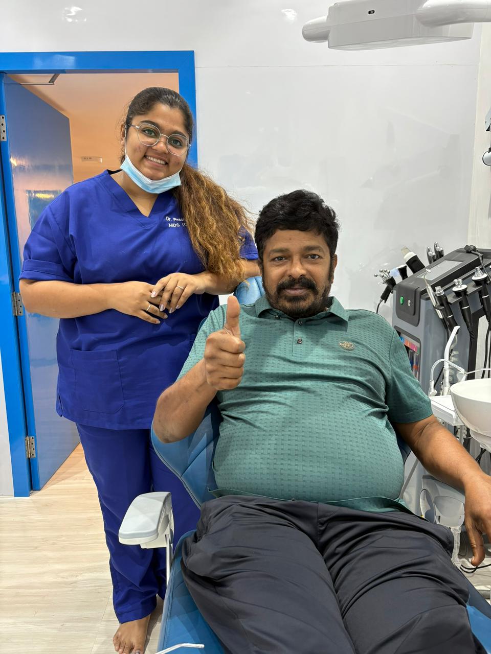 Dr. Prachee with a happy patient 5
